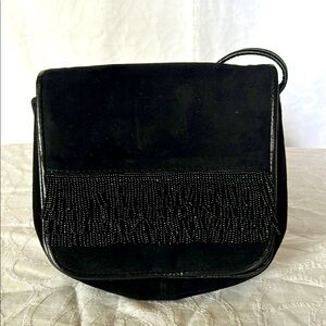J. RENEE black mini suede leather crossbody. Beads hanging down on the front.